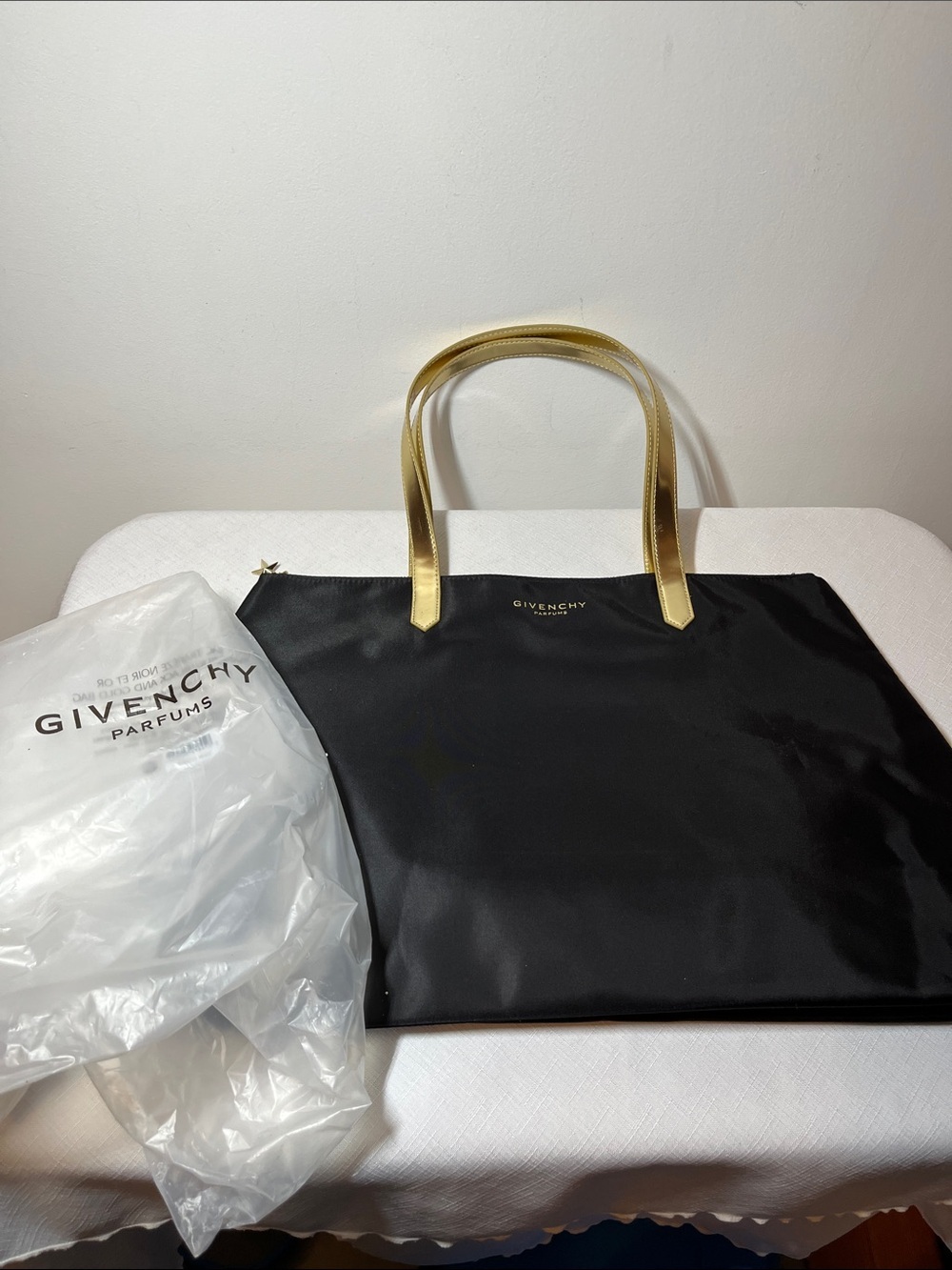 Givenchy Parfums Black Tote with Gold Handles and Star Zipper. 
New
